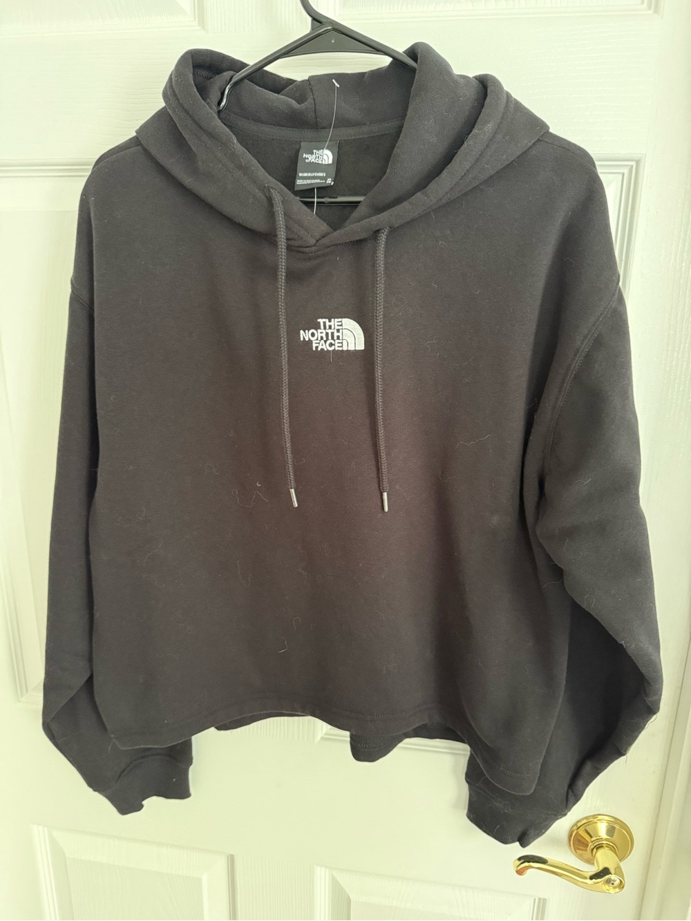 The North Face Black Pullover Hoodie with White Logo. Brand new,size XL.